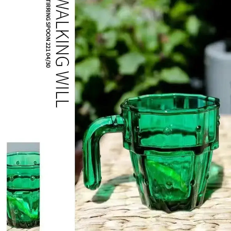 Emerald green glass mug with faceted octagonal body and rounded handle by decorbites cactus glass mug with textured ridges