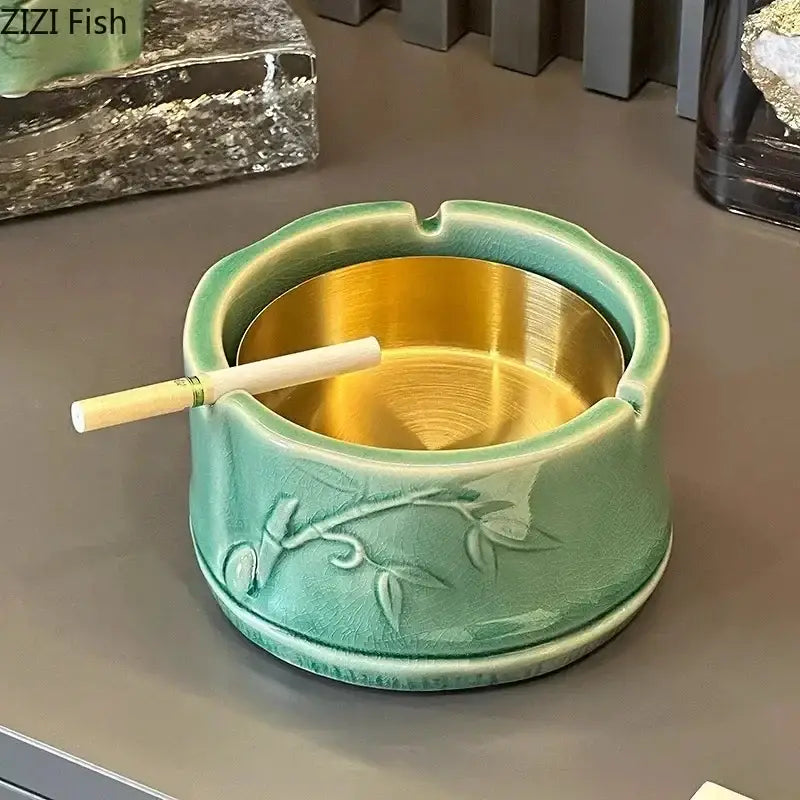 Green ceramic bamboo tissue box with teal ashtray featuring gold interior and embossed bamboo design for living room decor