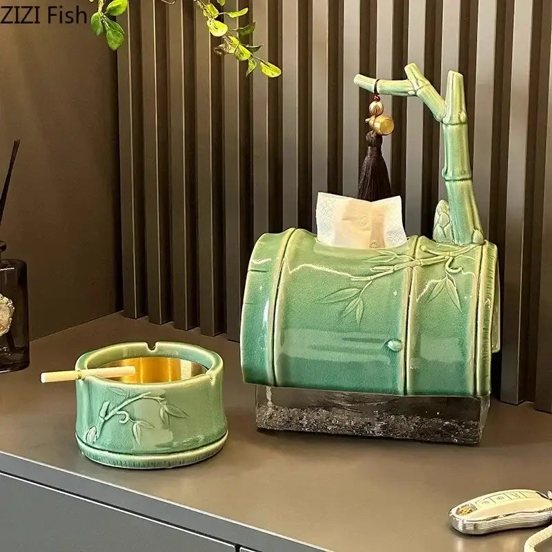 Green ceramic bamboo tissue box with carved leaf patterns and matching ashtray with gold lining for living room decor