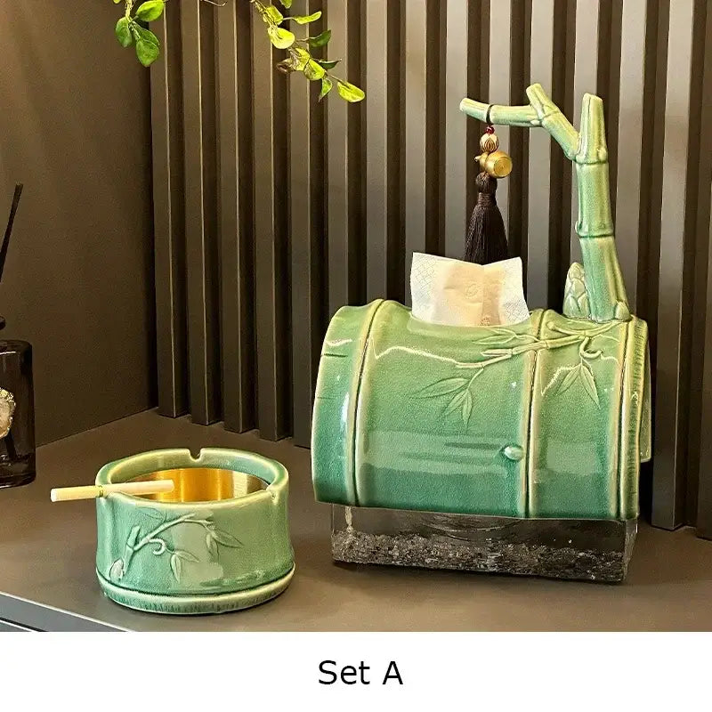 Green ceramic bamboo tissue box and matching ashtray with carved leaf patterns and glossy finish for living room decor