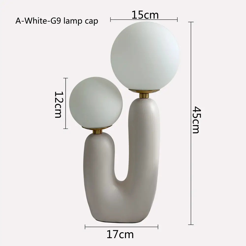 Modern minimalist green ceramic table lamp with double frosted glass spherical shades for bedroom lighting