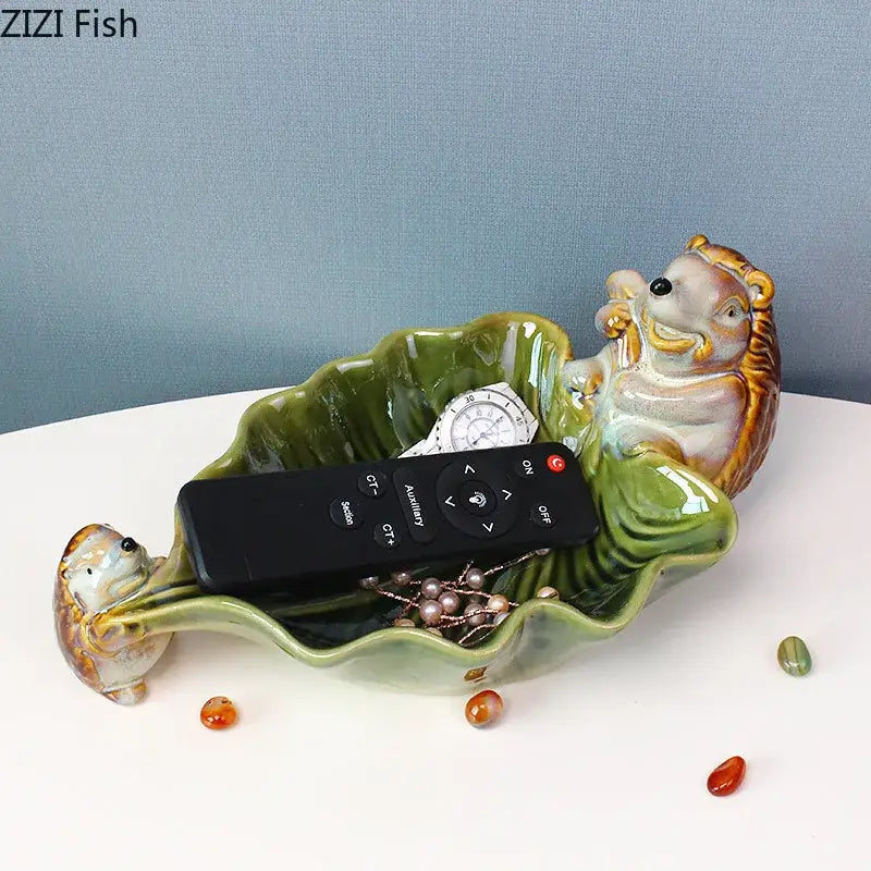 Green ceramic leaf decor tray with whimsical porcupines for dining room storage by decorbites ceramic leaf