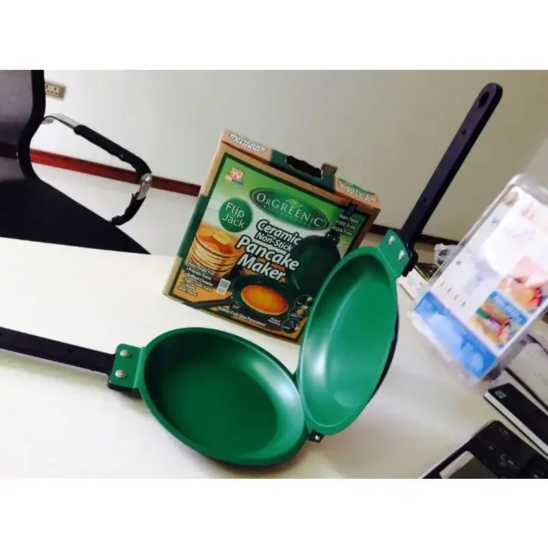 Green ceramic double sided pancake frying pan with black handle for non-stick omelet and sided pancake frying use
