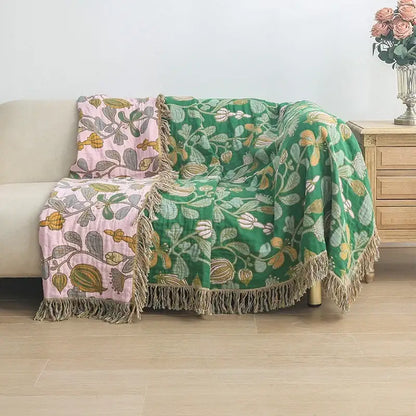 Cozy green and pink floral decorbites cotton tassel sofa blanket with fringed edges in soft cotton texture for living room decor