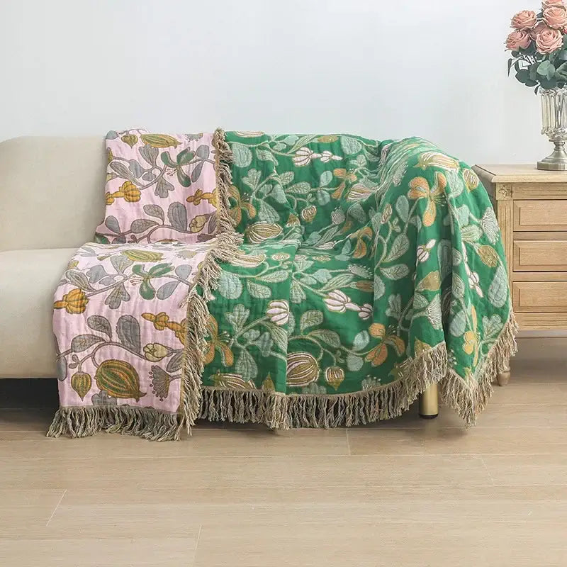 Cozy green and pink floral decorbites cotton tassel sofa blanket with fringed edges in soft cotton texture for living room decor