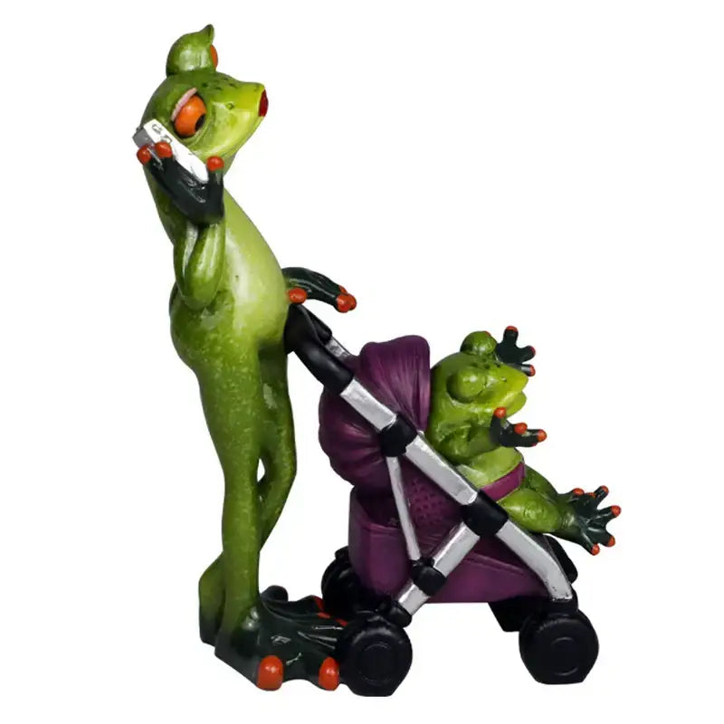 Green frog family statue set with orange eyes and red toenails pushing purple stroller resin decorbites frog family