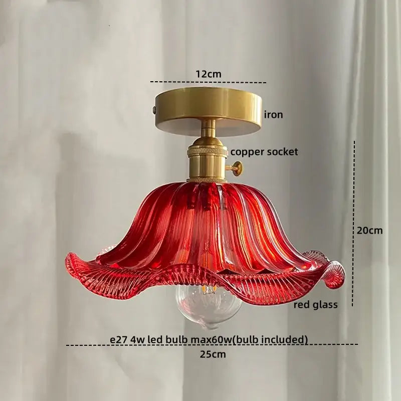 A vibrant red glass copper nordic ceiling lamp with brass iron fixture and fluted design for living room use