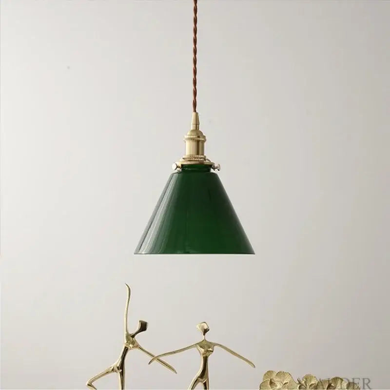 Green enamel pendant light with brass hardware and twisted brown cord featuring decorbites copper canopy for dining room