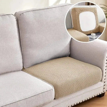 Beige herringbone-patterned couch cover with elastic edges for sectional sofa in living room use
