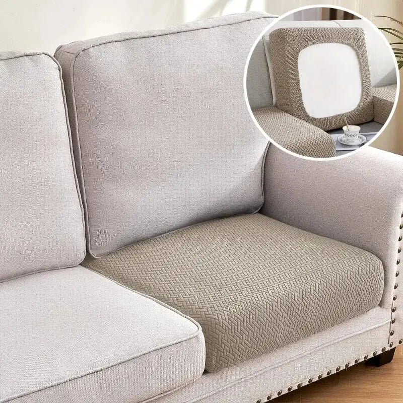 Beige herringbone-patterned sectional sofa cushion cover with elasticized edges for living room couch cover