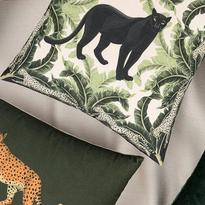 Square cream fabric premium cushion cover with bold black panther and green jungle leaves for living room decor