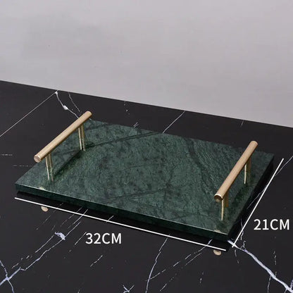 A sleek rectangular serving tray with a deep green marble surface and polished brass handles for green marble bathroom use