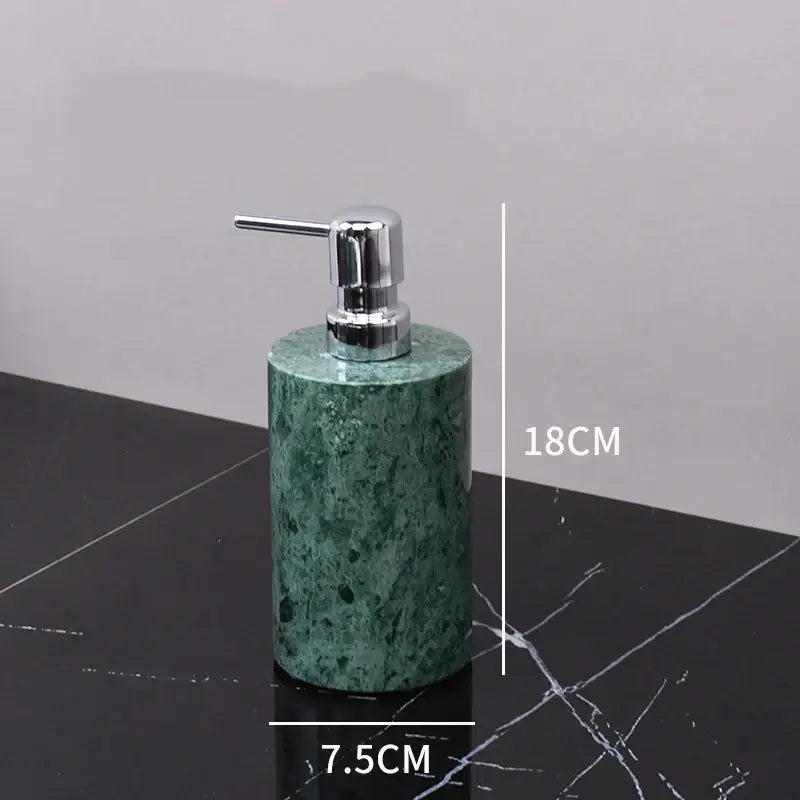 Green marble soap dispenser with sleek chrome pump from a marble bathroom set with gold accents bathroom accessories
