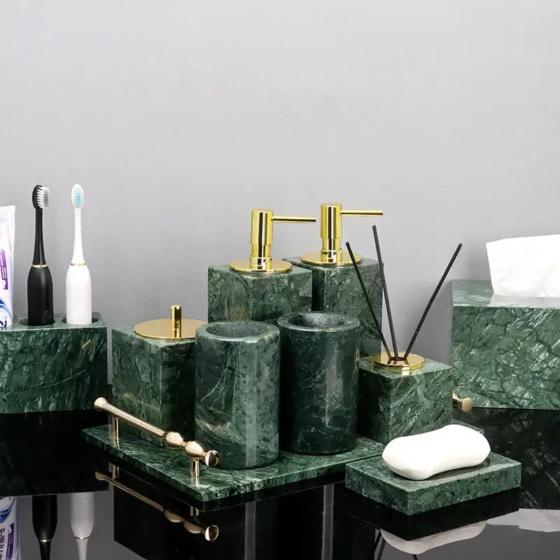 Green marble bathroom set featuring gold-tone metal accents for elegant marble bathroom accessory use