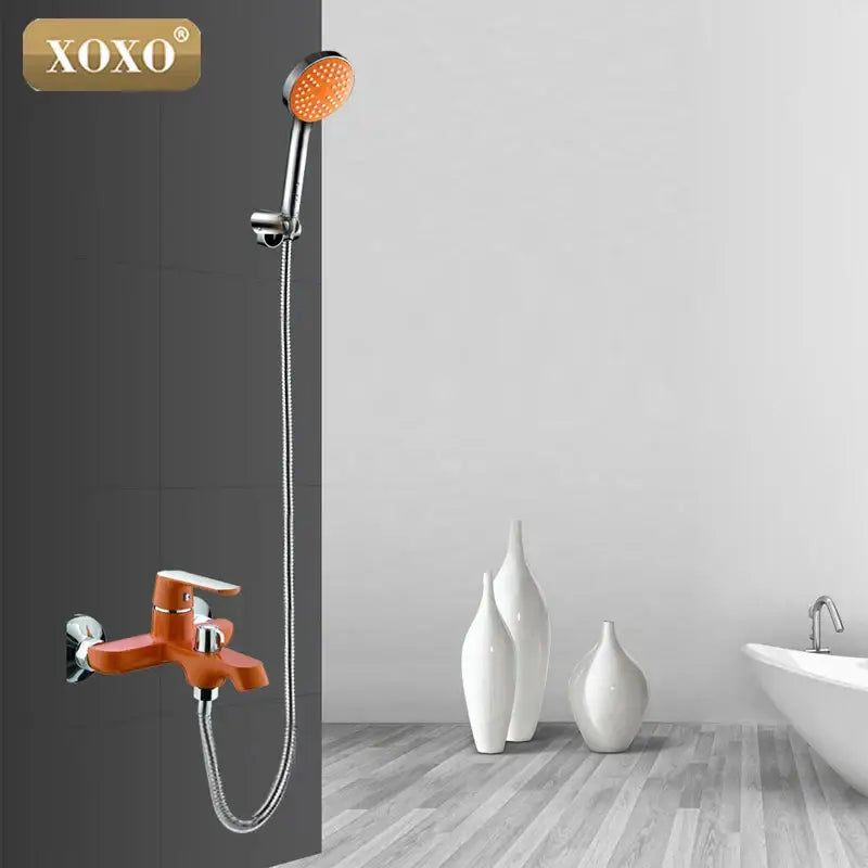 Green and orange chrome shower faucet set by Orange xoxo with handheld showerhead and chrome finish hose