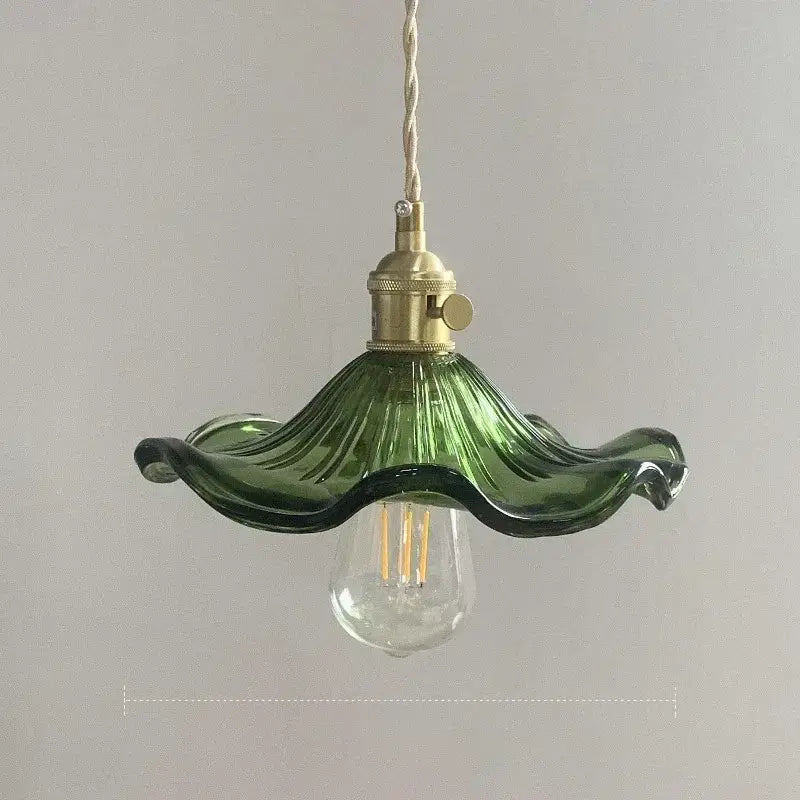 Green and orange leaf glass pendant light with delicate wavy design and polished copper hardware for dining room