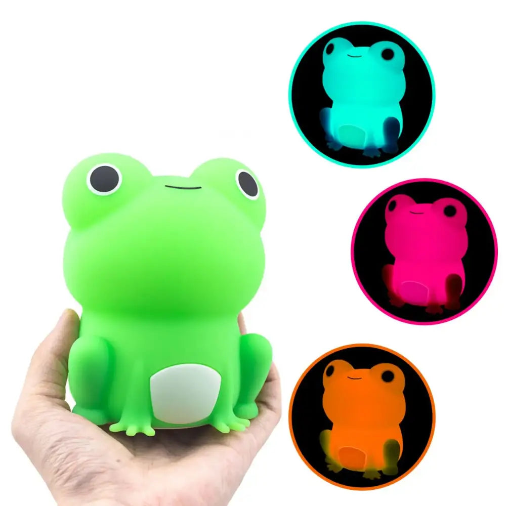 A soft lime-green silicone frog night light with a white belly and black eyes for bedroom decorbites frog night use