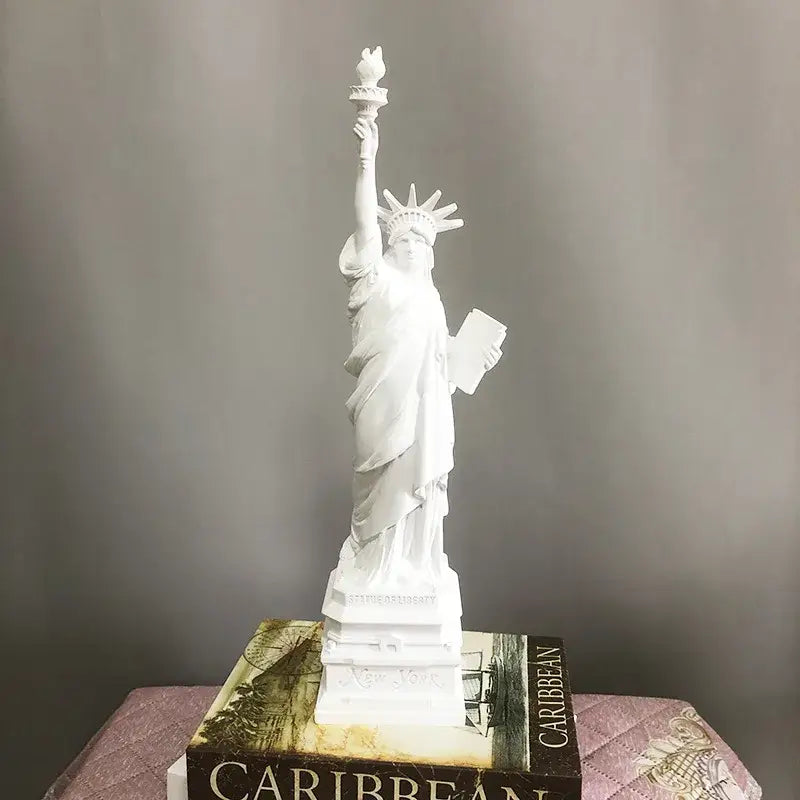 White resin decorbites liberty statue desk model with raised torch and tablet on book base for office decor