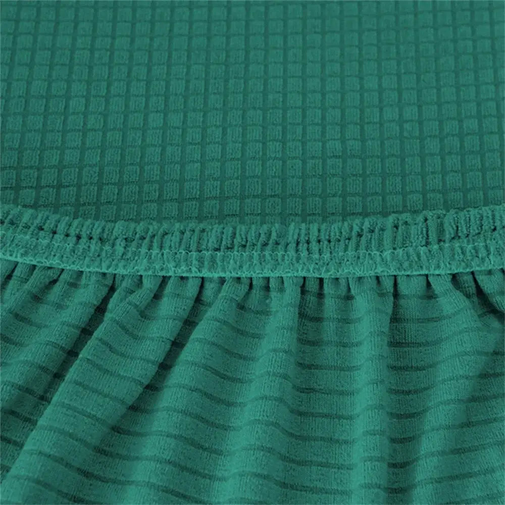 Emerald green decorbites jacquard elastic seat cover with waffle texture, elasticated hem, and ruffled lower edge