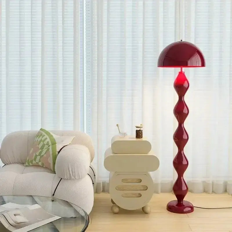 A deep red glossy floor lamp with a twisted stem and dome shade for decorbites circle mushroom floor lighting