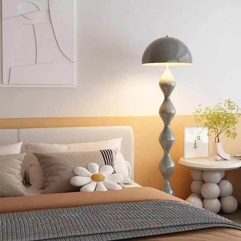 A sleek gray decorbites circle mushroom floor lamp with a twisted base for modern living room lighting and decor
