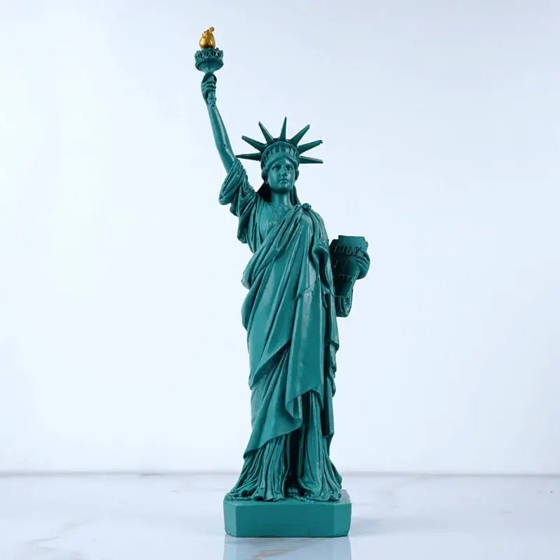 Green resin liberty statue model with gold-tipped torch for office desk decor by decorbites liberty statue