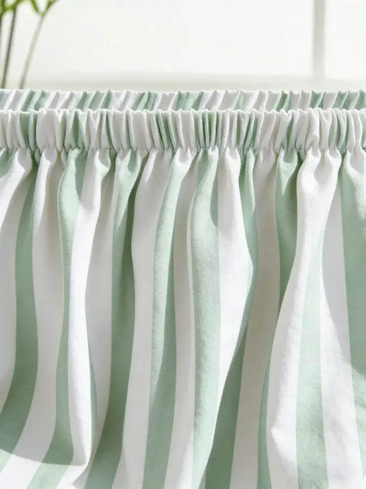 Green and white striped sofa cushion cover with soft mint green and white vertically striped curtain pattern and elasticated top edge