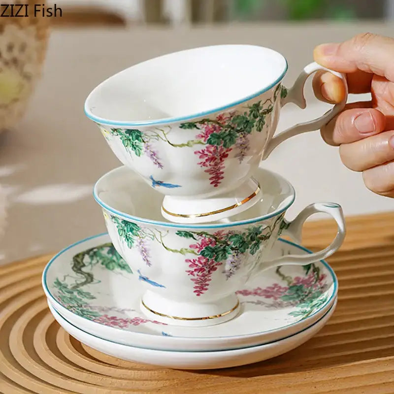 White porcelain green willow porcelain teacup with pink wisteria blossoms gold trim and matching saucer by decorbites