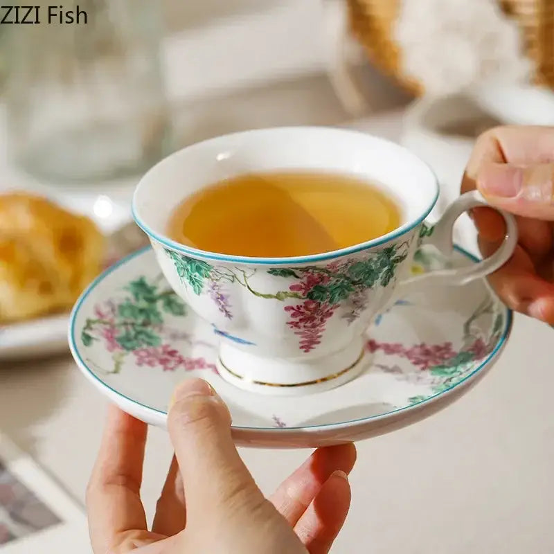 Green willow porcelain tea cup and saucer set with hand-painted pink wisteria and gold trim for decorbites green willow