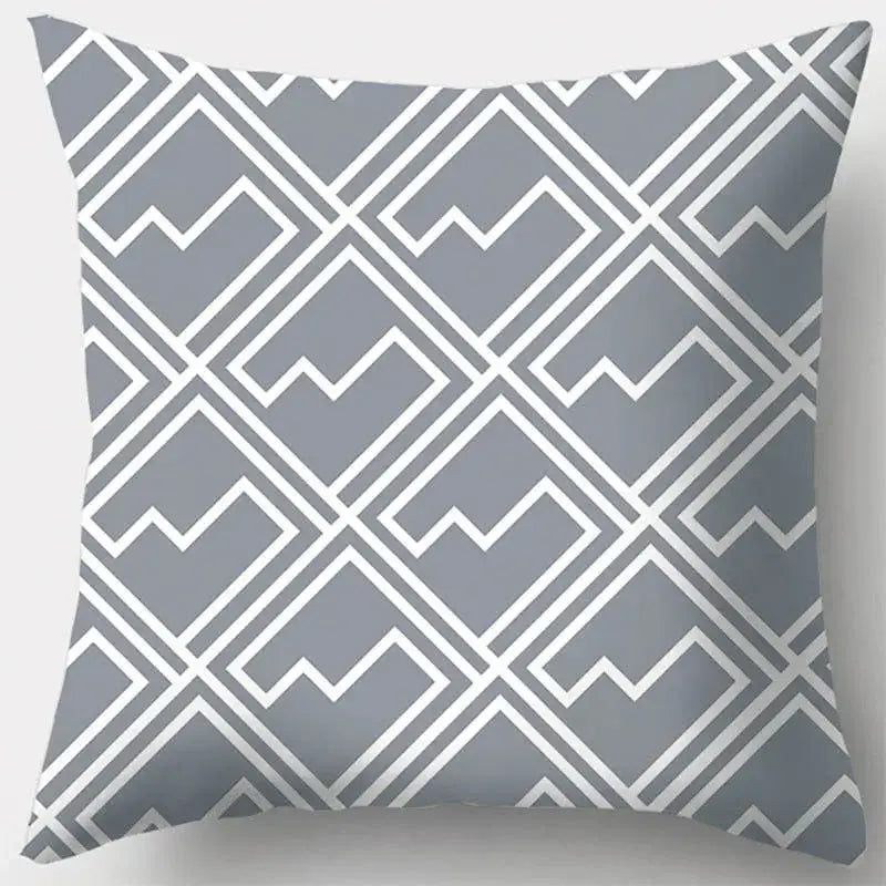 Grey geometry patterned pillow case featuring white zigzag diamond shapes for living room decor