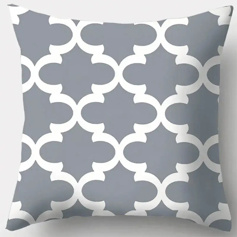 Grey geometry patterned pillow case with white quatrefoil design ideal for living room decor and comfort