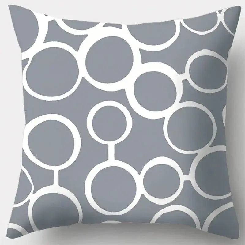Grey throw pillow case with modern grey geometry pattern of overlapping white circles for living room decor