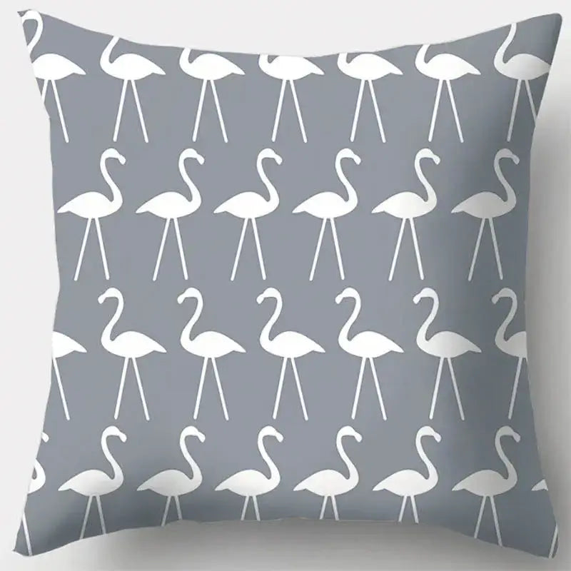Grey throw pillow case with white flamingo silhouettes featuring grey geometry pattern for living room decor
