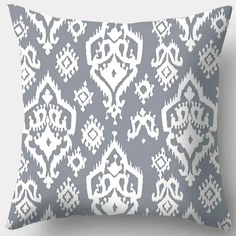 Gray and white ikat-patterned pillow case featuring grey geometry leaves design for living room decor