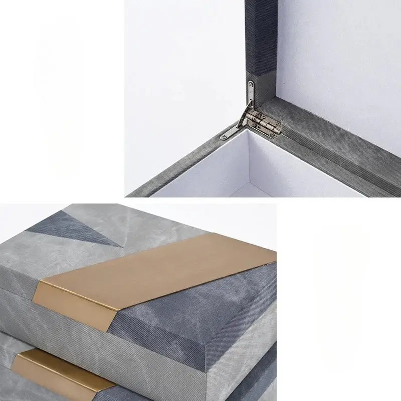 Gray and gold geometric storage box with textured fabric exterior for a grey marble pattern leather jewelry container