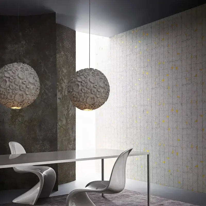 Two spherical white ceramic pendant lights with textured surfaces in decorbites grey wabi sabi chandelier for living room
