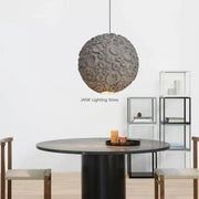 Grey wabi sabi chandelier featuring a textured cratered grey spherical pendant light for living room decorbites grey wabi