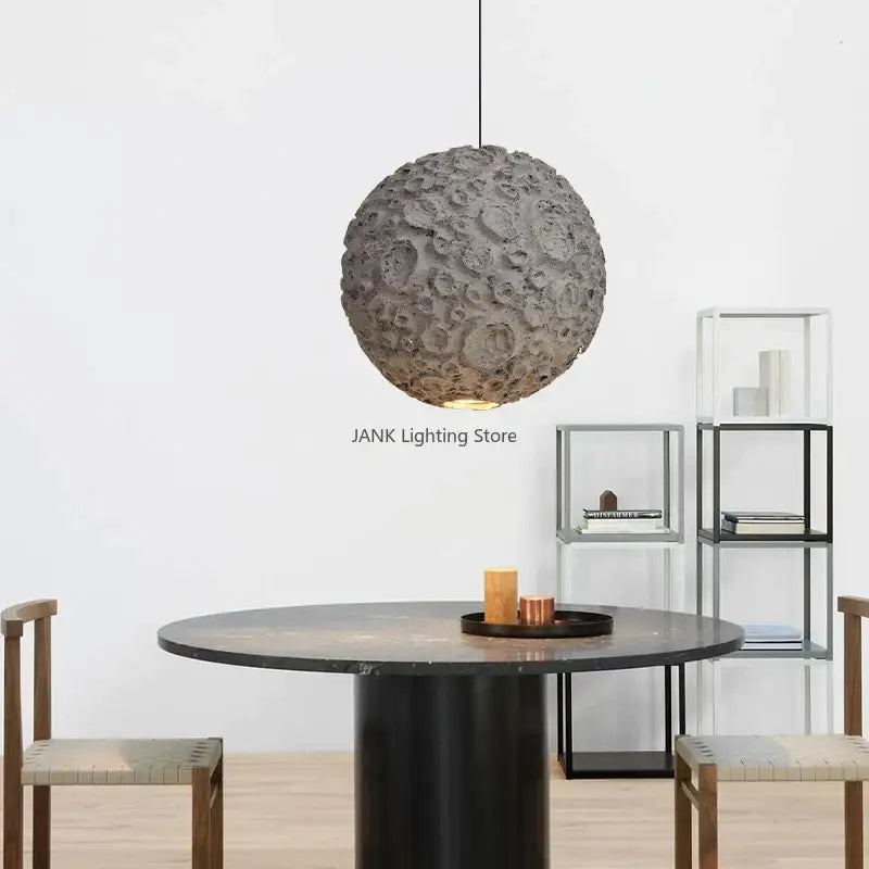 Grey wabi sabi chandelier featuring a textured cratered grey spherical pendant light for living room decorbites grey wabi