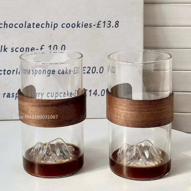 Transparent glass guanshan hanging ear coffee cup with dark brown wooden band and mountain-shaped base for kitchen decorbites
