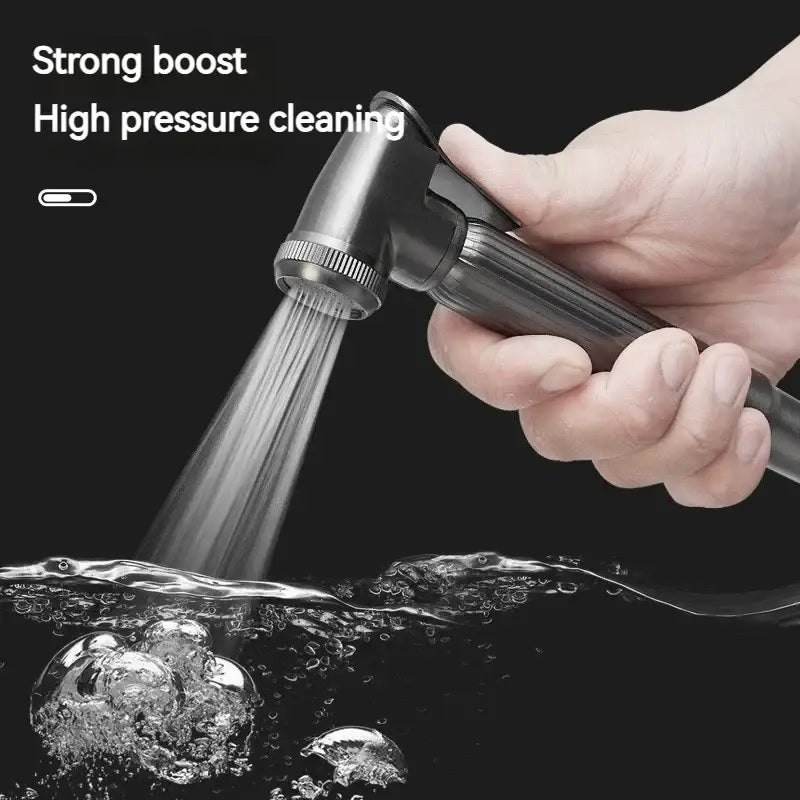 Black handheld showerhead with textured grip and adjustable nozzle in gunmetal gray copper bidet parts set