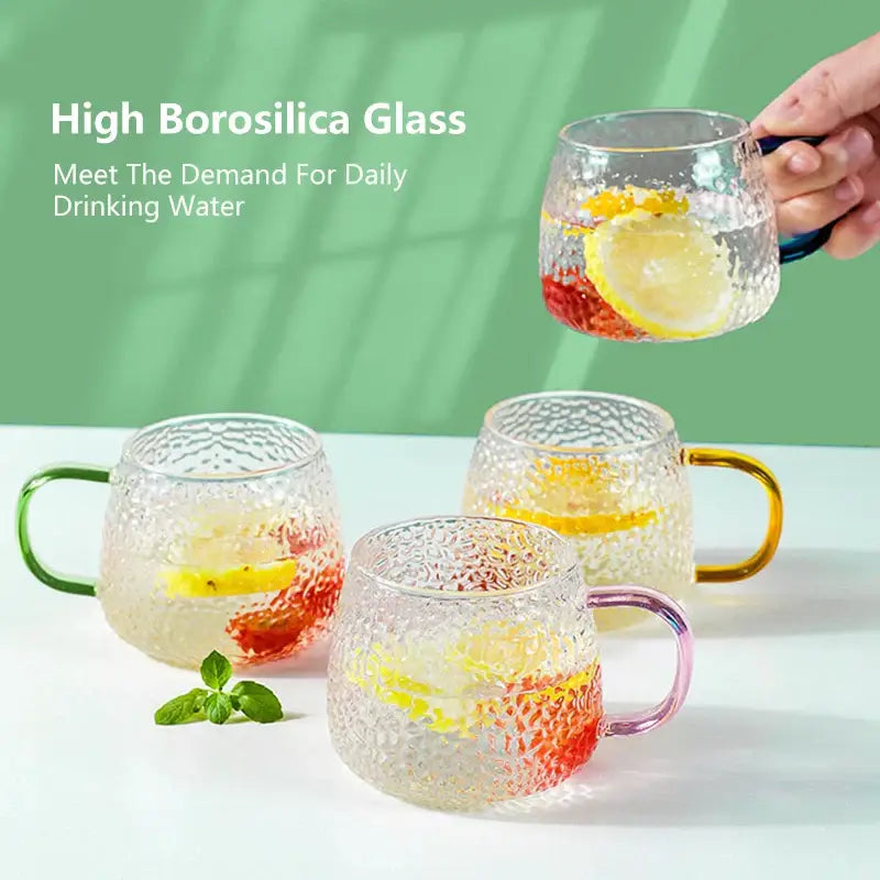 Clear textured 400ml hammer pattern glass mug with colorful green yellow and pink handles for kitchen glassware