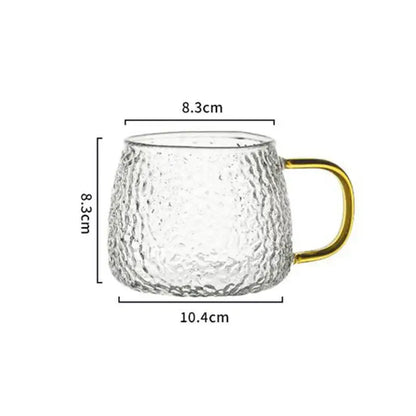 Clear textured 400ml hammer pattern glass mug with gold-colored handle for elegant kitchen glassware use