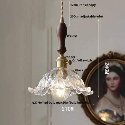 Delicate clear glass led pendant light with fluted petal design and dark walnut handle perfect for kitchen lighting
