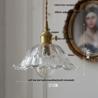 Clear glass led pendant light with fluted petal design and brass copper-finished hardware for kitchen lighting