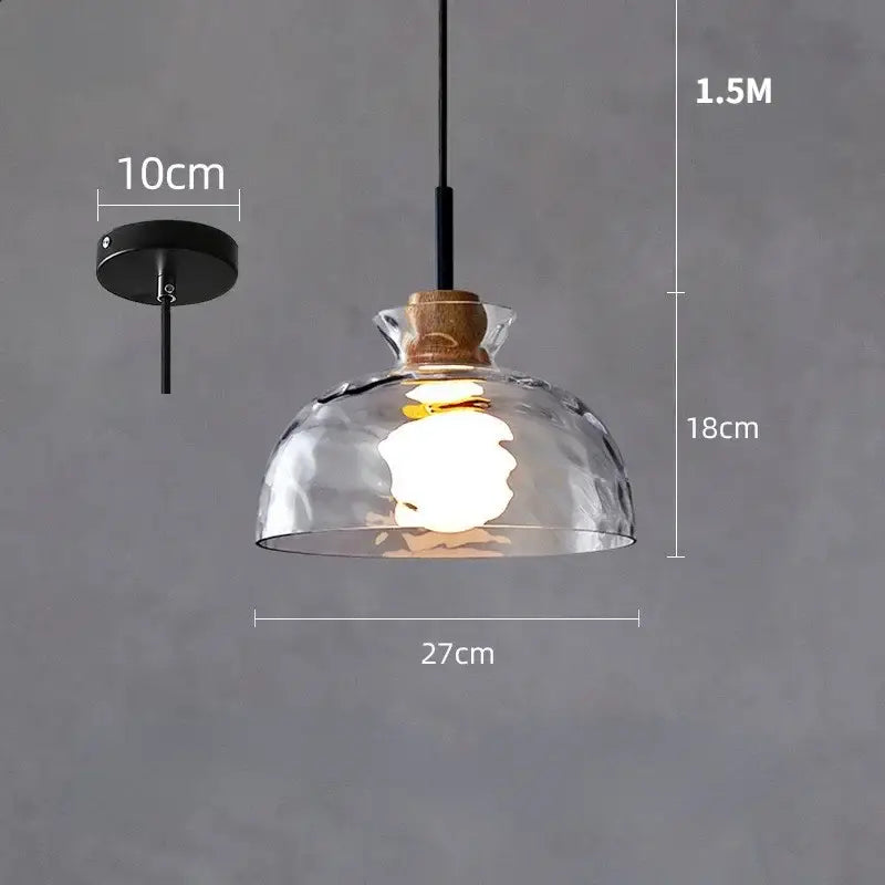 Clear glass pendant light with hammered glass dome, wooden cork accent, and black metal hardware for kitchen decorbites clear glass decor