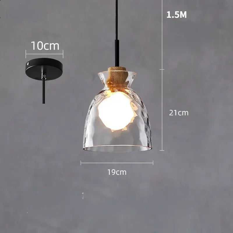 Clear glass pendant light with hammered texture cork accents and black metal hardware ideal for kitchen decorbites clear glass