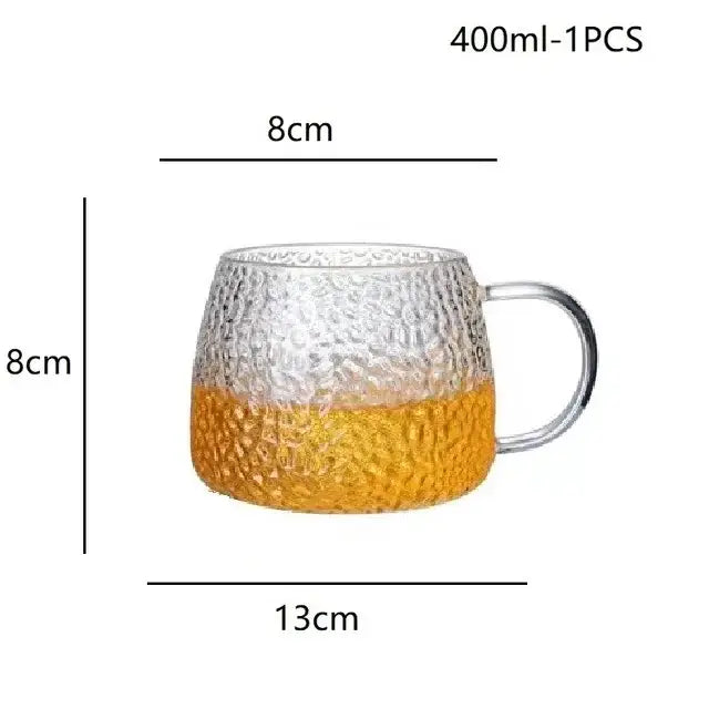 Hammered clear glass water cup with gold-colored base and metallic handle 400ml capacity ideal as a glass water cup
