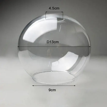 Hand blown clear glass globe lampshade with a 13cm diameter and smooth surface for living room lighting