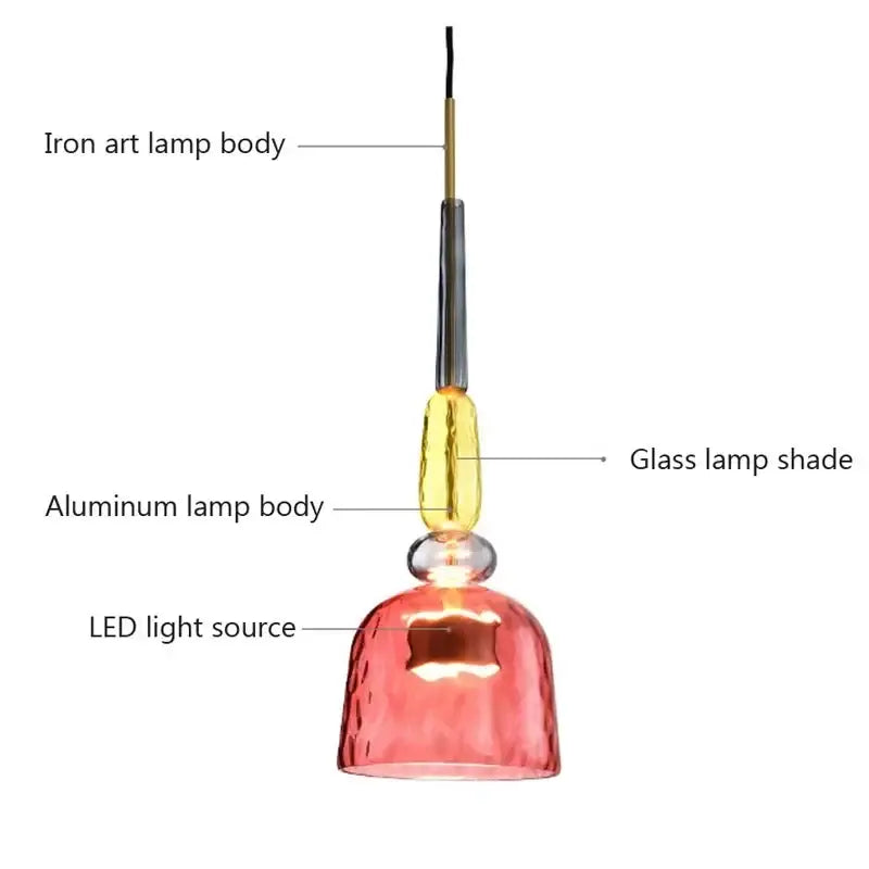 A modern pendant light with a textured pink hand blown candy glass shade and gold toned aluminum decorbites candy glass chandelier