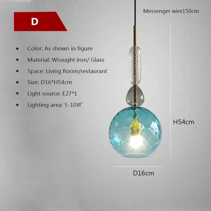 Modern pendant light with a spherical textured blue candy glass globe and twisted wrought iron suspension for dining room decorbites candy glass chandelier